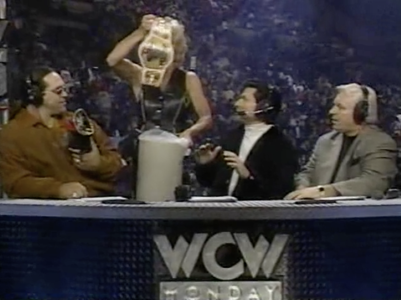 Madusa dumps the WWF Women's Championship in a garbage can.